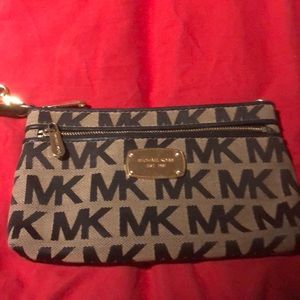 Michael Kors wristlet tan and black logo